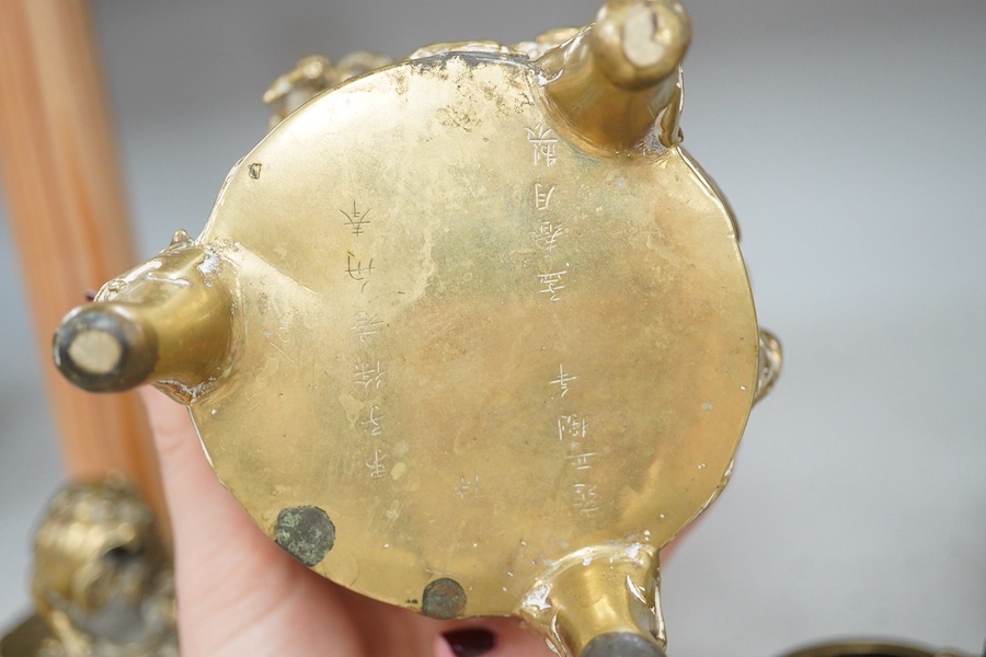 A pair of inscribed Chinese polished bronze reticulated censers, liners and covers, late 19th century, 20cm high together with a Cairo ware box, Condition - fair to good.